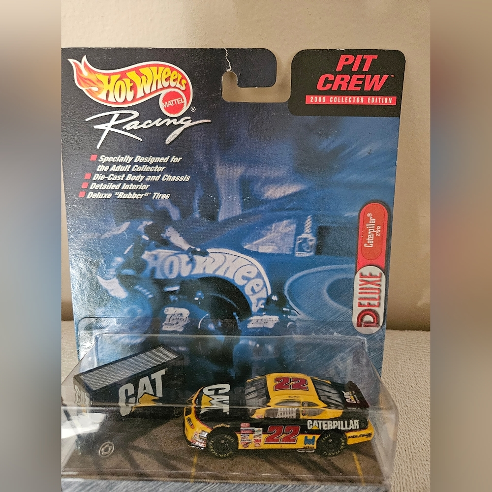 Hot Wheels 1:64 scale die cast car. NASCAR #22 CATERPILLAR. NWOT!!!
